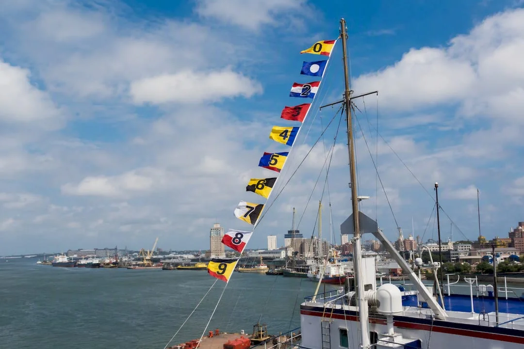 Nautical numeral pennants hoisted on mast