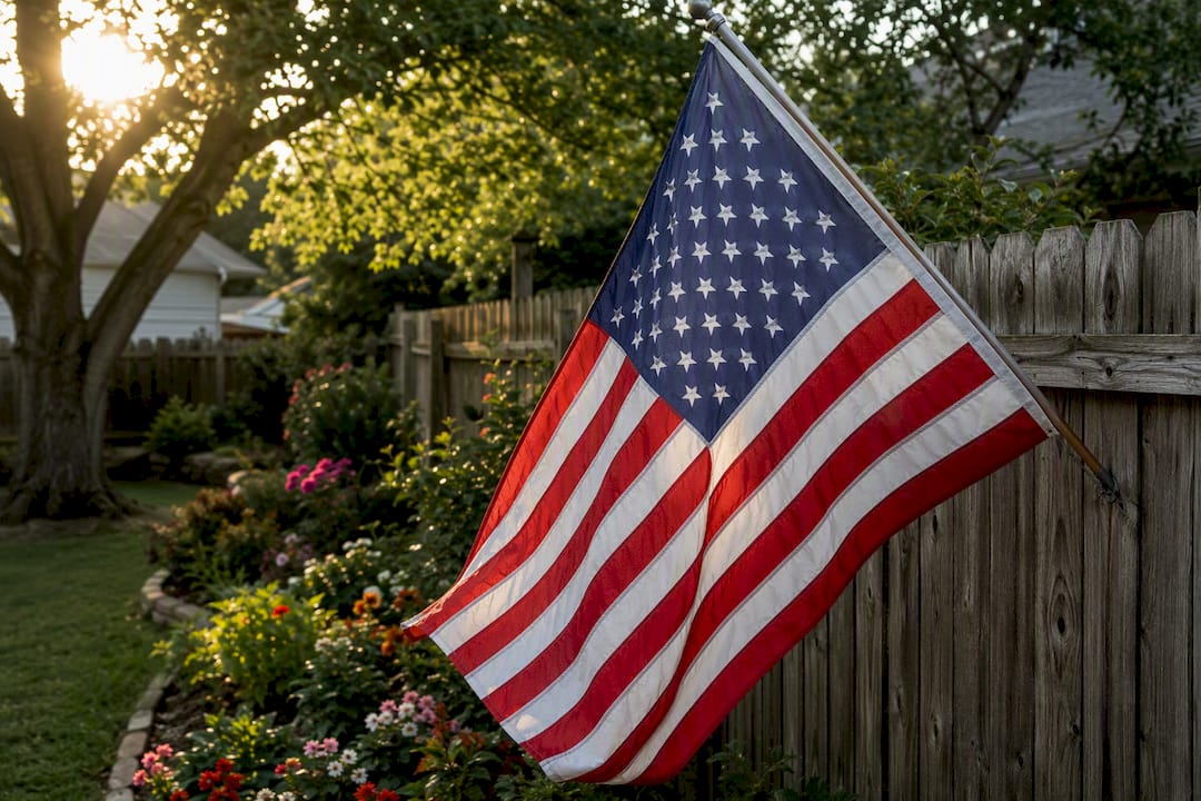 Flag on pole and banner on wall outdoors