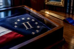 Close-up of II and star flag symbolism